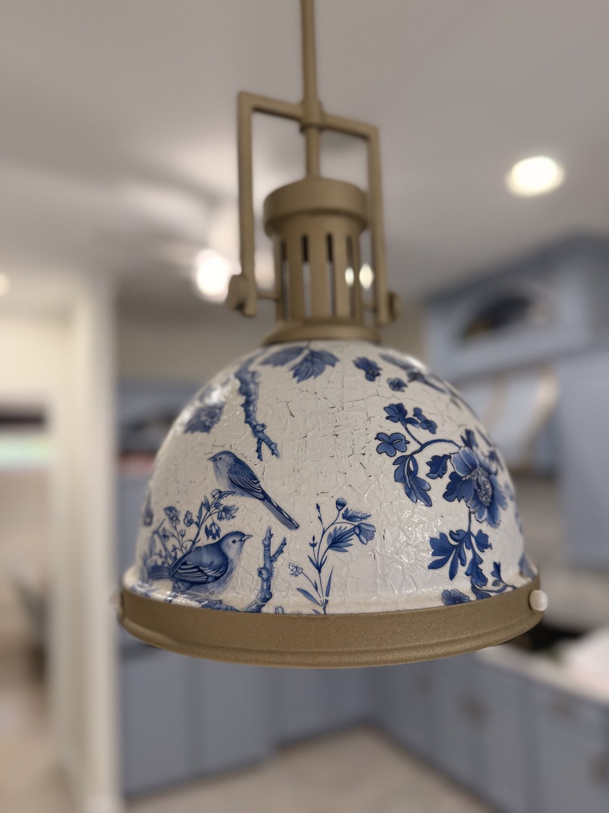 Blue and white bird shade on a brass Restoration Hardware lamp